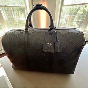 Gucci GG Embossed Duffle Bag